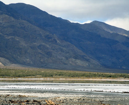 Groundwater discharge and rainfall-runoff collect and evaporate from this brackish playa lake in Saline Valley, CA